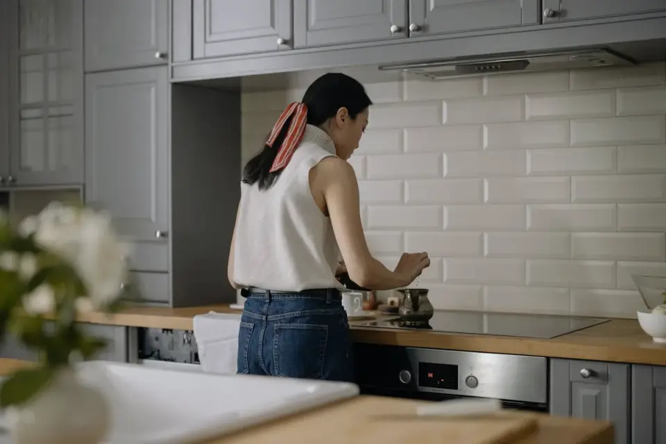 Dog owner preparing a meal