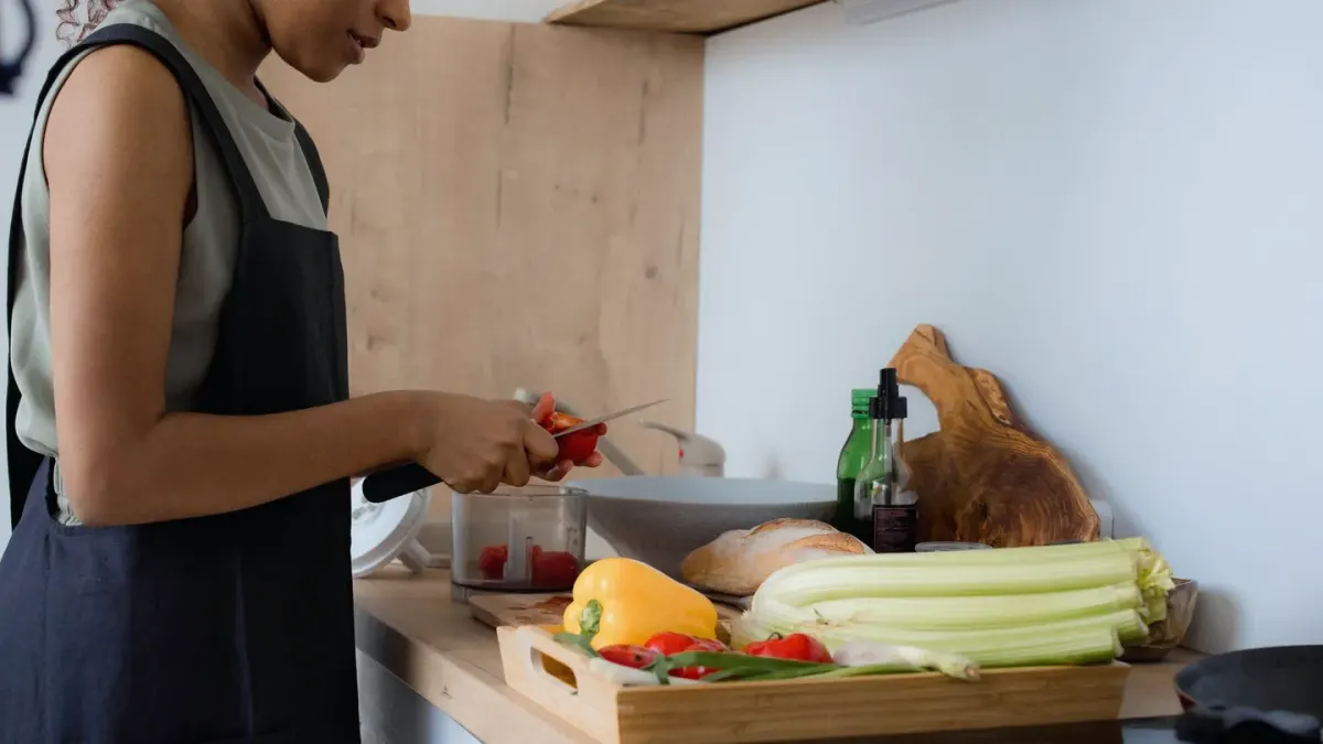 Dog owner preparing a meal