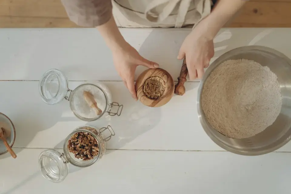 Dog owner preparing dog food kitchen