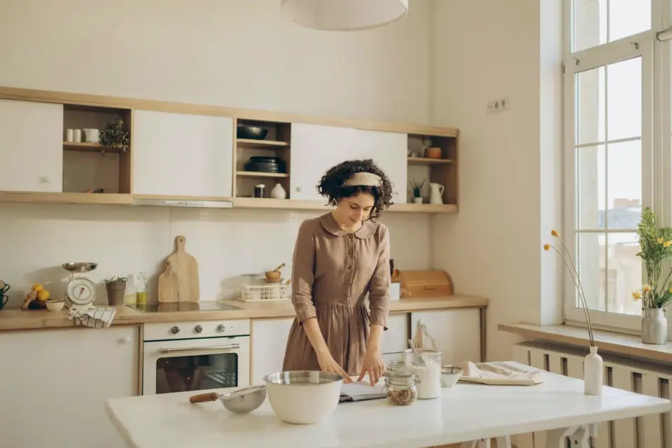 Dog owner preparing dog food kitchen
